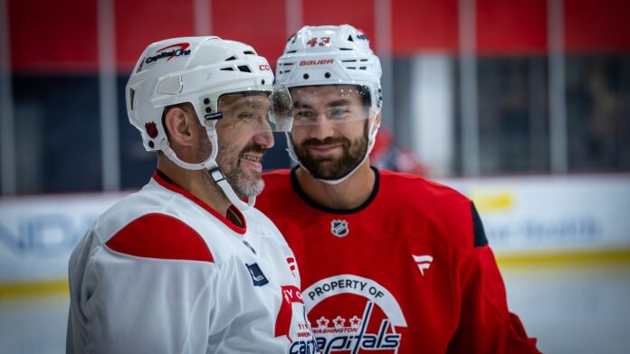 Alex Ovechkin smiles alongside Tom Wilson at the Capitals informal skate before 2026-27 training camp