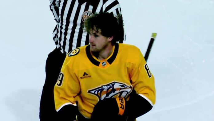 Ozzy Wiesblatt Predators Gold Star Showcase fight Ozzy Wiesblatt skates off with an official after fighting his brother Oasiz during the Nashville Predators Gold Star Showcase intrasquad scrimmage in Clarksville