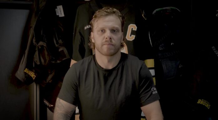 David Pastrnak Named Bruins Captain, 28th in Team History David Pastrnak stands in the Bruins locker room during the team video announcing him as the 28th captain in franchise history