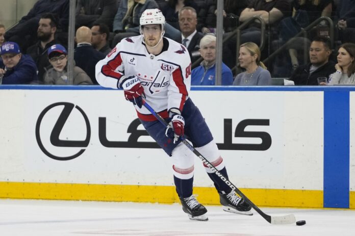 Pierre-Luc Dubois Capitals Washington Capitals center Pierre-Luc Dubois looks to pass during an NHL game against the New York Rangers