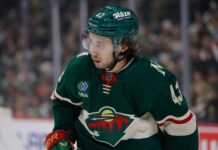 Quinn Hughes Extension: He Passed on More Than Makar Got Minnesota Wild defenseman Quinn Hughes looks on during a game at Grand Casino Arena in St. Paul