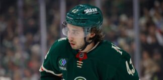 Quinn Hughes Extension: He Passed on More Than Makar Got Minnesota Wild defenseman Quinn Hughes looks on during a game at Grand Casino Arena in St. Paul