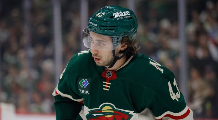 Quinn Hughes Extension: He Passed on More Than Makar Got Minnesota Wild defenseman Quinn Hughes looks on during a game at Grand Casino Arena in St. Paul