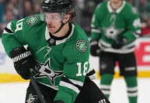Sam Steel skates with the puck for the Dallas Stars after signing a four-year contract extension