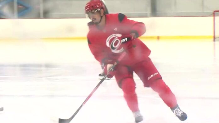 Seth Jarvis skating at Lane Arena during shoulder rehab Seth Jarvis injury rehab skate Carolina Hurricanes 2026 shoulder surgery