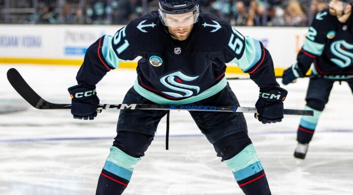 Shane Wright Trade: Agent Says He’s Committed to Kraken Shane Wright of the Seattle Kraken lines up for a faceoff at Climate Pledge Arena