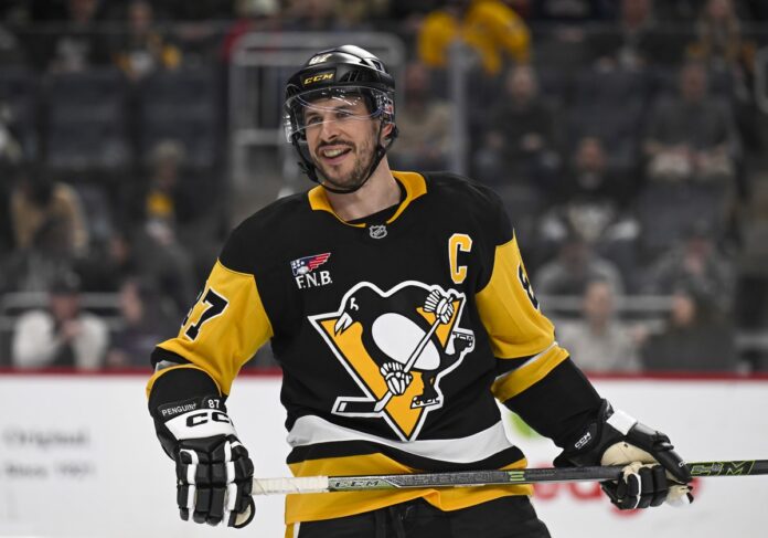 Pittsburgh Penguins center Sidney Crosby smiles during a game at PPG Paints Arena