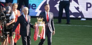 Kroenke Angels Purchase: Avalanche Owner Lands Record MLB Deal Avalanche owner Stan Kroenke and Josh Kroenke carry the Premier League trophy in May 2026