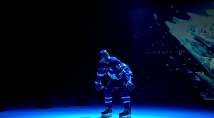 John Tavares Injury: Leafs Center Hurt vs. Sabres John Tavares in a Toronto Maple Leafs jersey during the 2026 NHL Player Media Tour photo shoot in Las Vegas
