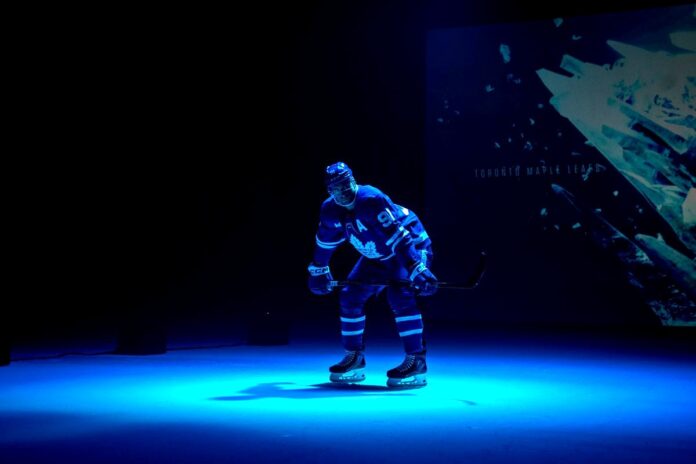 John Tavares at the 2026 NHL Player Media Tour John Tavares in a Toronto Maple Leafs jersey during the 2026 NHL Player Media Tour photo shoot in Las Vegas