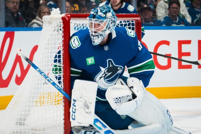 Thatcher Demko Canucks goalie Vancouver Canucks goalie Thatcher Demko in the net against the Winnipeg Jets at Rogers Arena