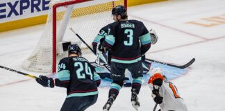Flyers Winger Trade: Konecny, Tippett Drawing Interest Travis Konecny shoots through traffic in front of the Seattle Kraken net