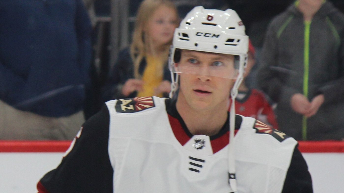 Jakob Chychrun in a white Arizona Coyotes jersey during warmups