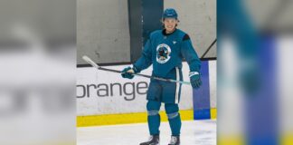 Stenberg Top Line: Sharks Rookie Joins Celebrini, Smith Will Smith smiles during a San Jose Sharks practice in April 2026