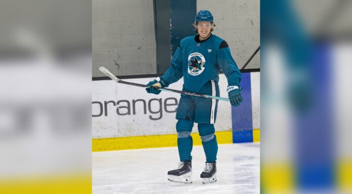 Stenberg Top Line: Sharks Rookie Joins Celebrini, Smith Will Smith smiles during a San Jose Sharks practice in April 2026