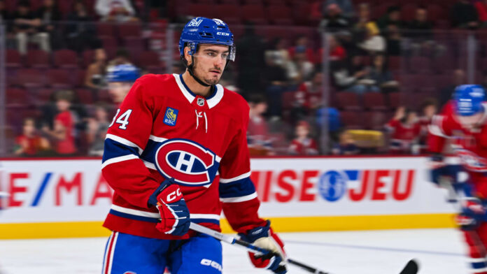 william-trudeau-predators-waiver-claim William Trudeau skates during a game, wearing a Montreal Canadiens jersey