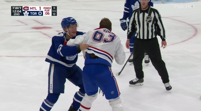 Xhekaj Brothers: Arber Watches Florian’s Fight From the Box Montreal Canadiens forward Florian Xhekaj fights Toronto Maple Leafs defenseman Marshall Rifai during a 2026 NHL preseason game at Scotiabank Arena