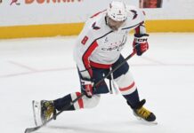 Ovechkin Retirement: Semin Says He’ll Break Gretzky’s Record Washington Capitals captain Alex Ovechkin takes a shot in a white road jersey against the Pittsburgh Penguins