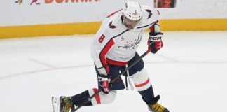 Ovechkin Retirement: Semin Says He’ll Break Gretzky’s Record Washington Capitals captain Alex Ovechkin takes a shot in a white road jersey against the Pittsburgh Penguins