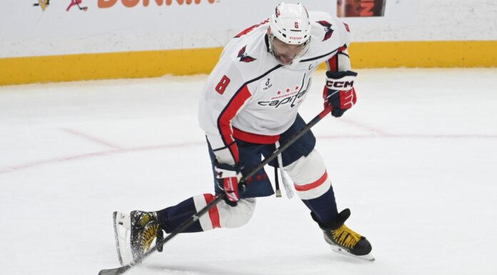 Ovechkin Retirement: Semin Says He’ll Break Gretzky’s Record Washington Capitals captain Alex Ovechkin takes a shot in a white road jersey against the Pittsburgh Penguins