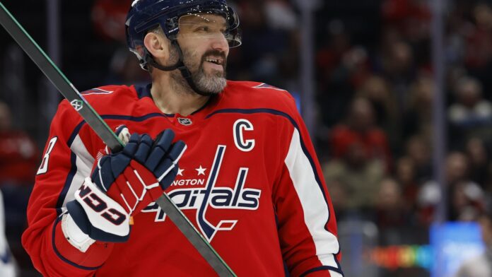 alex-ovechkin-capitals-two-year-contract Washington Capitals captain Alex Ovechkin smiles during a stoppage in play against the Maple Leafs at Capital One Arena