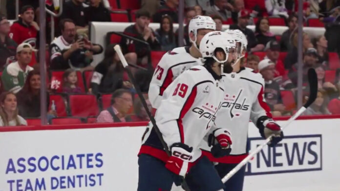 Alex Tuch Capitals debut goal celebration vs Hurricanes Alex Tuch No. 89 celebrates a goal in his Washington Capitals debut against the Carolina Hurricanes at Lenovo Center