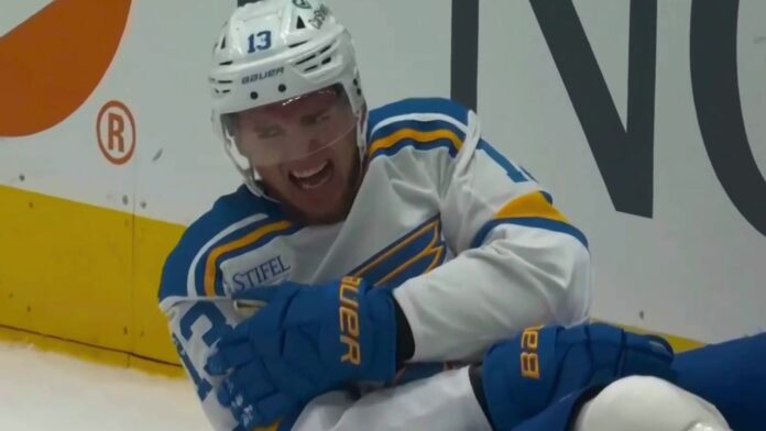Alexey Toropchenko injury Blues vs Stars Blues forward Alexey Toropchenko on the ice after an upper-body injury against the Dallas Stars in the 2026-27 season opener