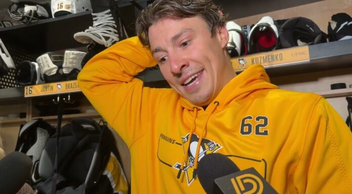 Andrei Kuzmenko Returns to Penguins, Switches to No. 62 Andrei Kuzmenko wearing a Penguins number 62 hoodie as he speaks to reporters in the Pittsburgh dressing room after returning to practice