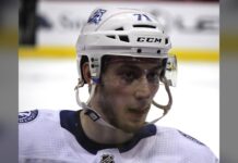 Cirelli Injury: Lightning Center Exits Win Over Vegas Lightning center Anthony Cirelli in white road jersey and helmet during warmups