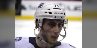 Cirelli Injury: Lightning Center Exits Win Over Vegas Lightning center Anthony Cirelli in white road jersey and helmet during warmups