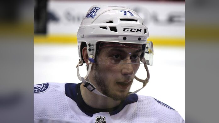 Anthony Cirelli Lightning injury Lightning center Anthony Cirelli in white road jersey and helmet during warmups