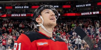 Gritsyuk Goal Streak: Devils Beat Kings, Hellebuyck Sits Arseny Gritsyuk Devils forward looks up in red jersey after win over Kings