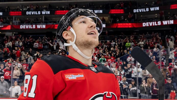 Arseny Gritsyuk Devils win Kings Arseny Gritsyuk Devils forward looks up in red jersey after win over Kings