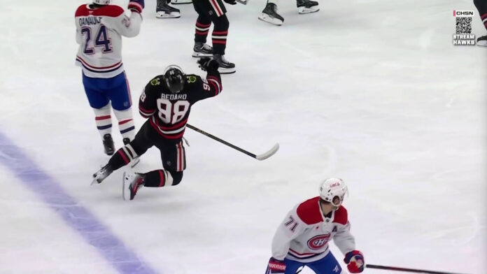 Bedard Danault hit Connor Bedard Blackhawks takes hit from Phillip Danault Canadiens