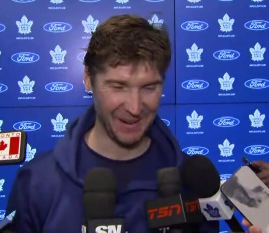Sergei Bobrovsky laughs while speaking to reporters about Gavin McKenna rookie lap at Maple Leafs media availability