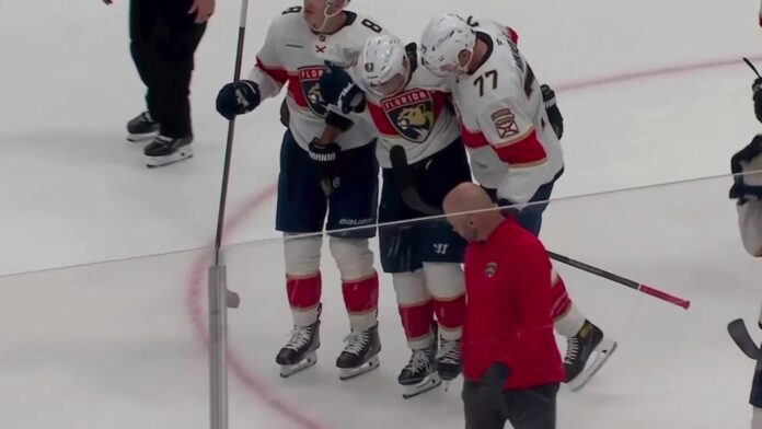 Brad Marchand injury Panthers vs Kings Brad Marchand helped off the ice by Panthers teammates Brady Tkachuk and Niko Mikkola after a lower-body injury against the Kings