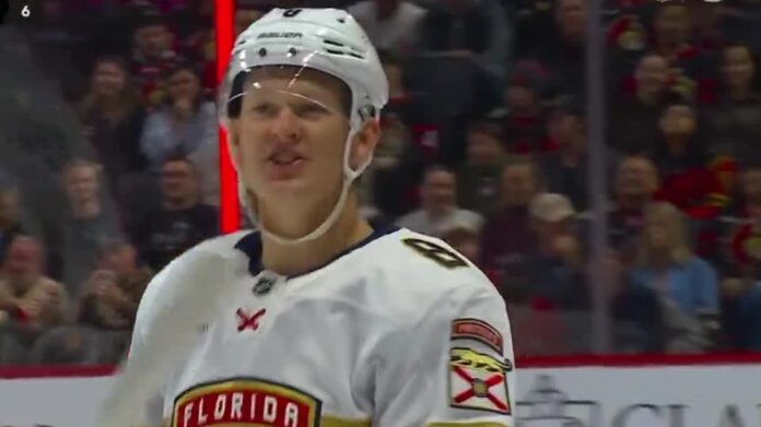 brady-tkachuk-postgame-reaction-ottawa-loss Brady Tkachuk smiling in Panthers jersey after scoring against the Senators in Ottawa