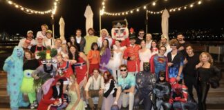 Hockey Halloween 2026: Best NHL Player Costumes Boston Bruins players and partners pose in Halloween costumes at the team party