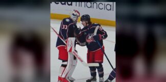 Cam Talbot Record: Wins With Ninth Franchise in Debut Cam Talbot celebrates with Kent Johnson after Blue Jackets shootout win over Penguins