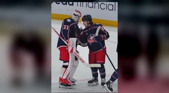 Cam Talbot Record: Wins With Ninth Franchise in Debut Cam Talbot celebrates with Kent Johnson after Blue Jackets shootout win over Penguins