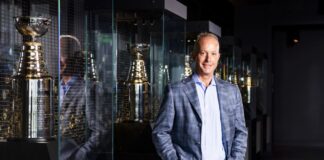 Charlie Jacobs Named Bruins Governor, Replacing Father Jeremy Charlie Jacobs Boston Bruins CEO and new governor standing beside Stanley Cup trophies