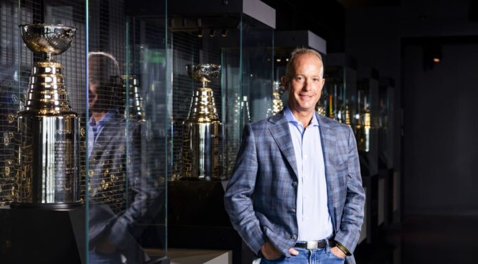 Charlie Jacobs Named Bruins Governor, Replacing Father Jeremy Charlie Jacobs Boston Bruins CEO and new governor standing beside Stanley Cup trophies