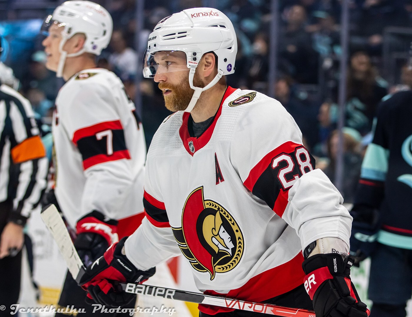 Claude Giroux in a white Ottawa Senators jersey wearing an alternate captain's A
