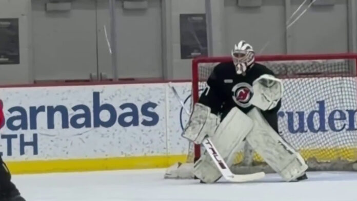 Connor Hellebuyck Devils practice debut Connor Hellebuyck in net at Devils practice in Newark
