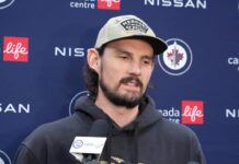 Hellebuyck Suspension: Jets Goalie’s Ban Ends Oct. 23 Connor Hellebuyck speaks to media at a Winnipeg Jets press conference
