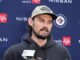 Hellebuyck Suspension: Jets Goalie’s Ban Ends Oct. 23 Connor Hellebuyck speaks to media at a Winnipeg Jets press conference