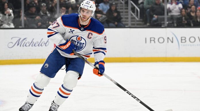 McDavid Assist Streak: Oilers Star Sets NHL Record at 13 Games Connor McDavid Edmonton Oilers captain skating during game, assist streak record
