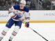 McDavid Assist Streak: Oilers Star Sets NHL Record at 13 Games Connor McDavid Edmonton Oilers captain skating during game, assist streak record