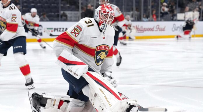 Cooper Black NHL Debut: Panthers Goalie Set to Be Tallest Ever Cooper Black Panthers goalie warming up NHL debut tallest goalie