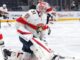 Cooper Black NHL Debut: Panthers Goalie Set to Be Tallest Ever Cooper Black Panthers goalie warming up NHL debut tallest goalie
